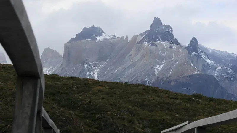 Turquoise waves rippling on Lake Pehoé with the majestic Cordillera del Paine rising in the distance.