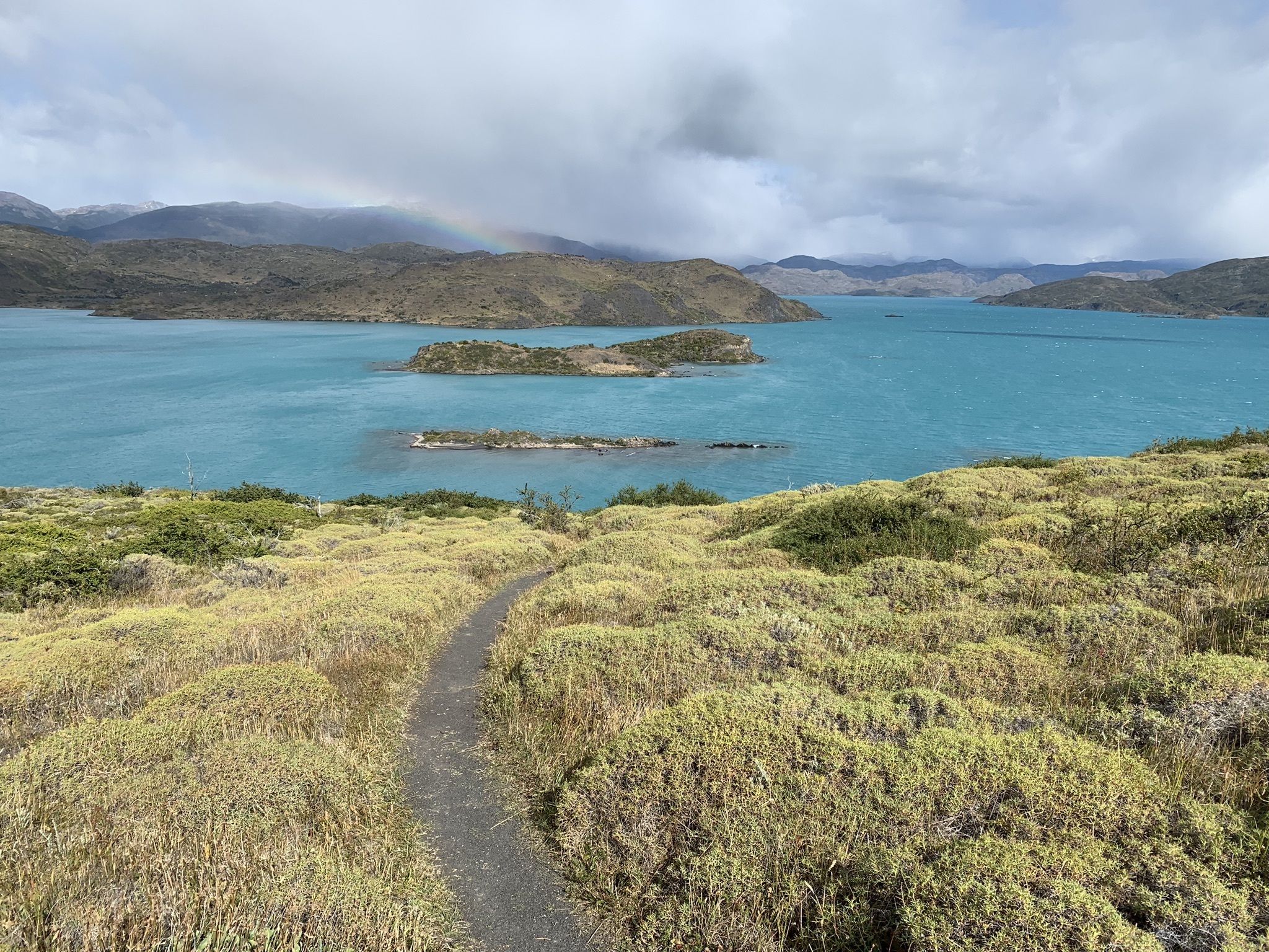 A breathtaking bird's-eye view of Lake Pehoé and the surrounding mountains from the top of Mirador Cóndor.