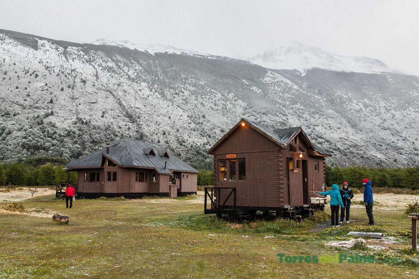 Backpackers arriving at Refugio Dickson after a long trek through the Patagonian wilderness.