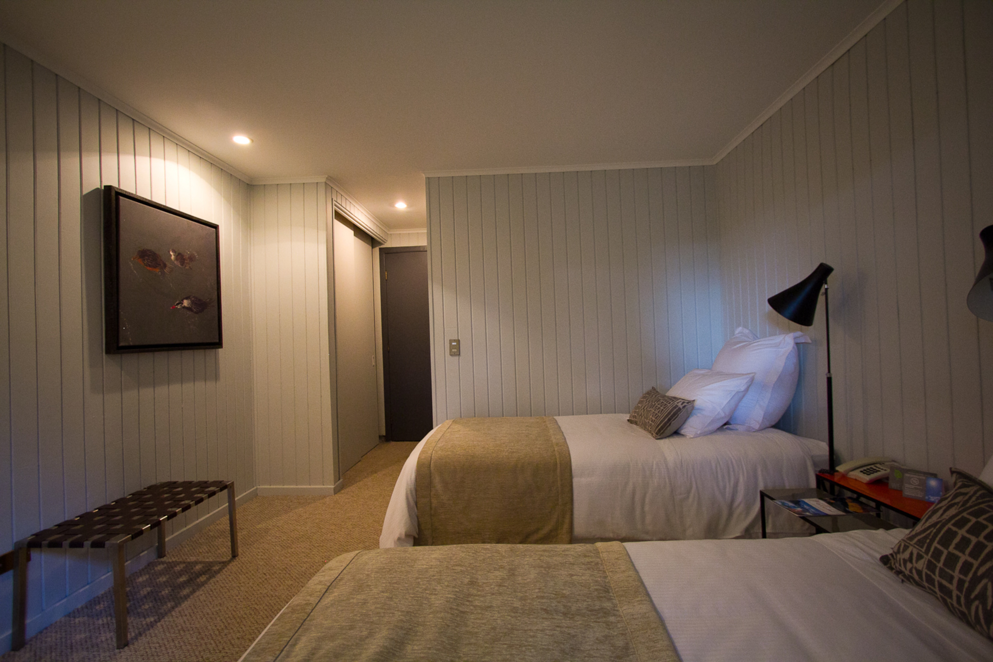 Sophisticated dining room at Hotel Lago Grey set for a formal dinner with mountain views.