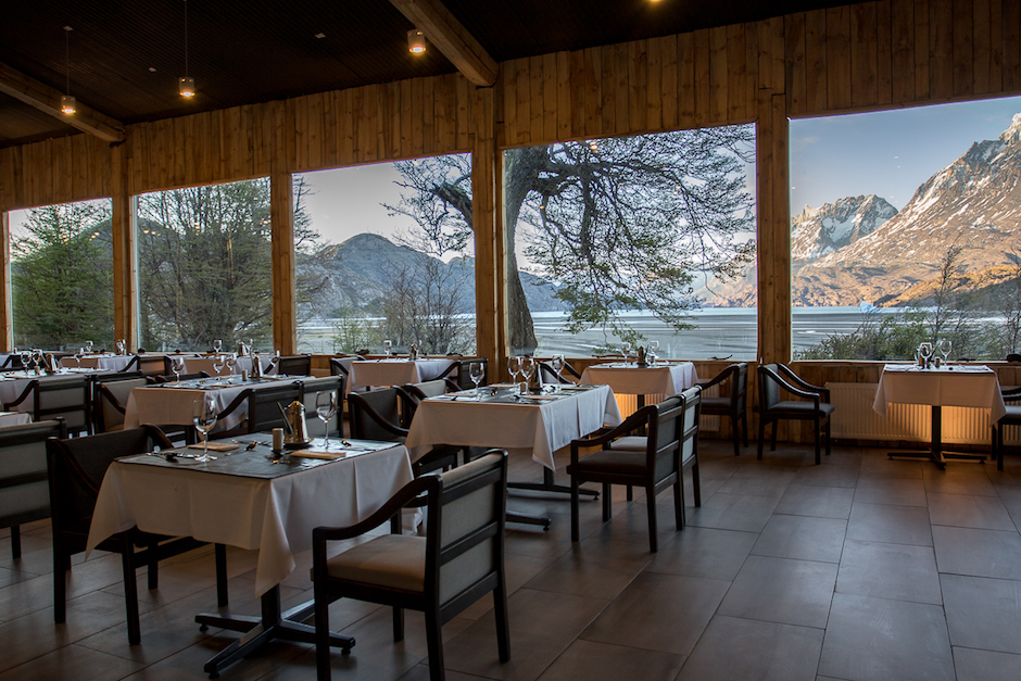 A scenic breakfast spread at the Hotel Lago Grey restaurant overlooking the forest.