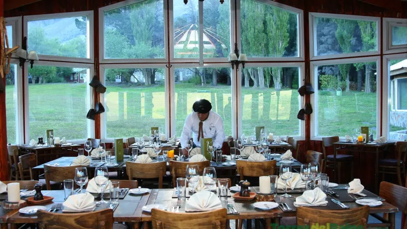 Exterior terrace of Hotel Las Torres with views of the Patagonian peaks.