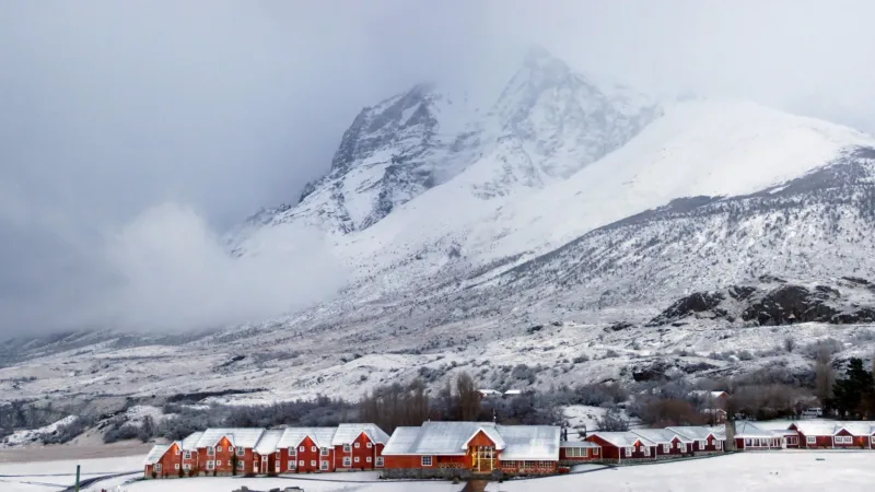 A bright and spacious superior room at Hotel Las Torres with mountain views.
