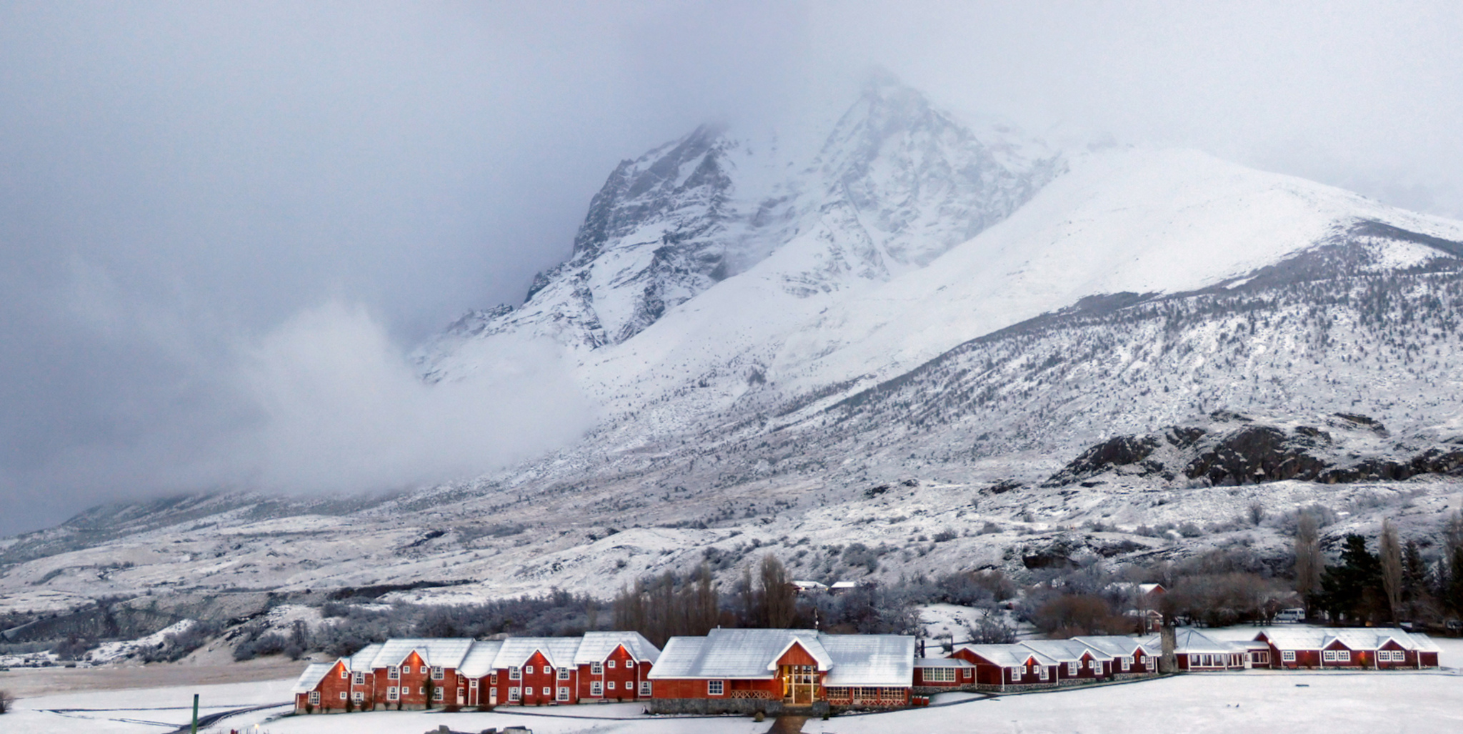 A bright and spacious superior room at Hotel Las Torres with mountain views.