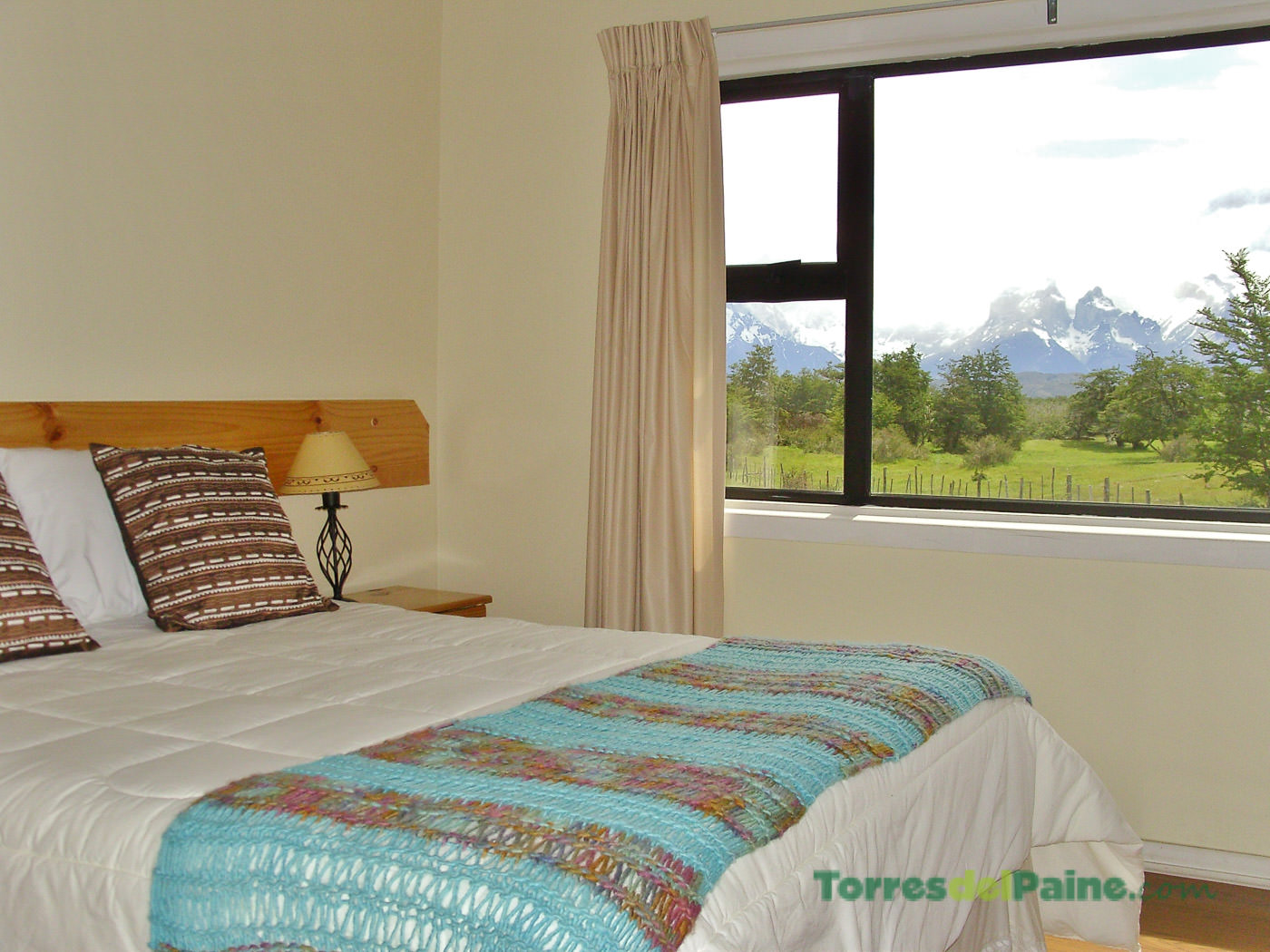 Modern bathroom facilities at Hotel Paine, maintaining a clean and rustic aesthetic.