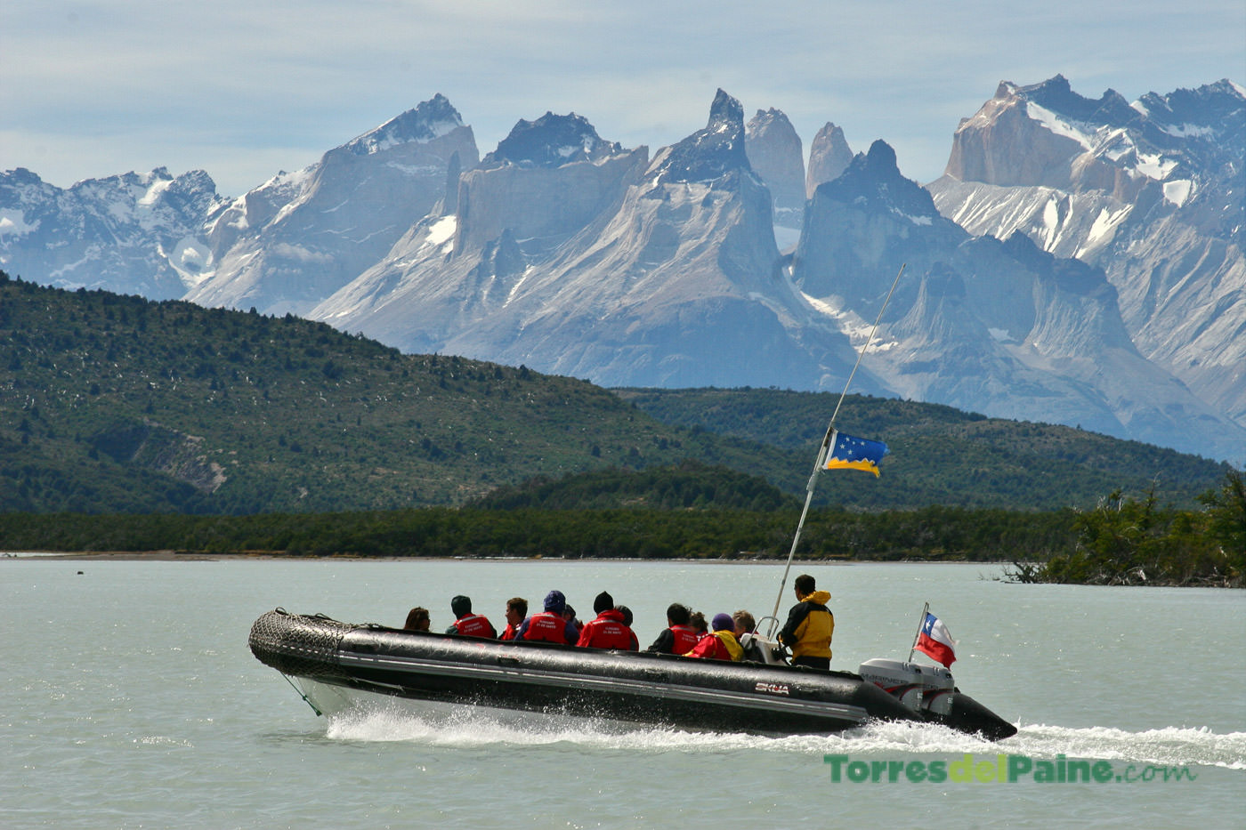 The hotel's entrance and lobby area, welcoming guests with local wood and stone architecture.