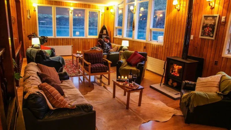 Guests enjoying a buffet breakfast at Restaurant Pehoé before heading out for a day of trekking.