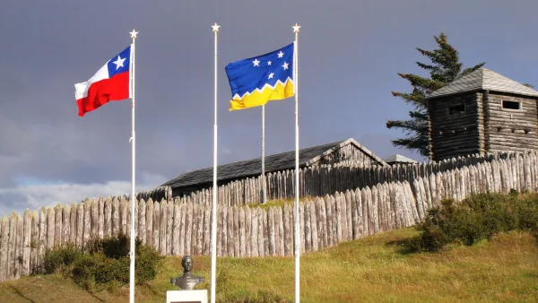 The historic wooden fortifications and buildings of Fuerte Bulnes overlooking the Strait of Magellan.