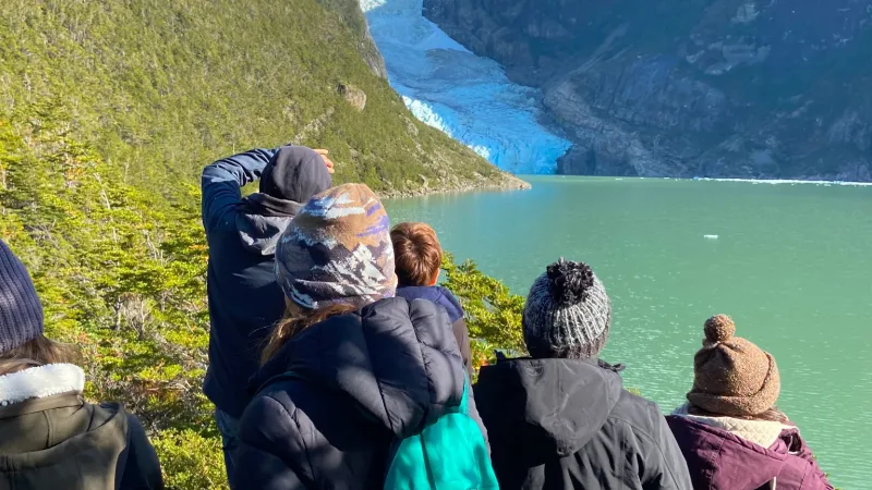 Looking across the iceberg-filled lagoon toward the massive wall of ice at Serrano Glacier.