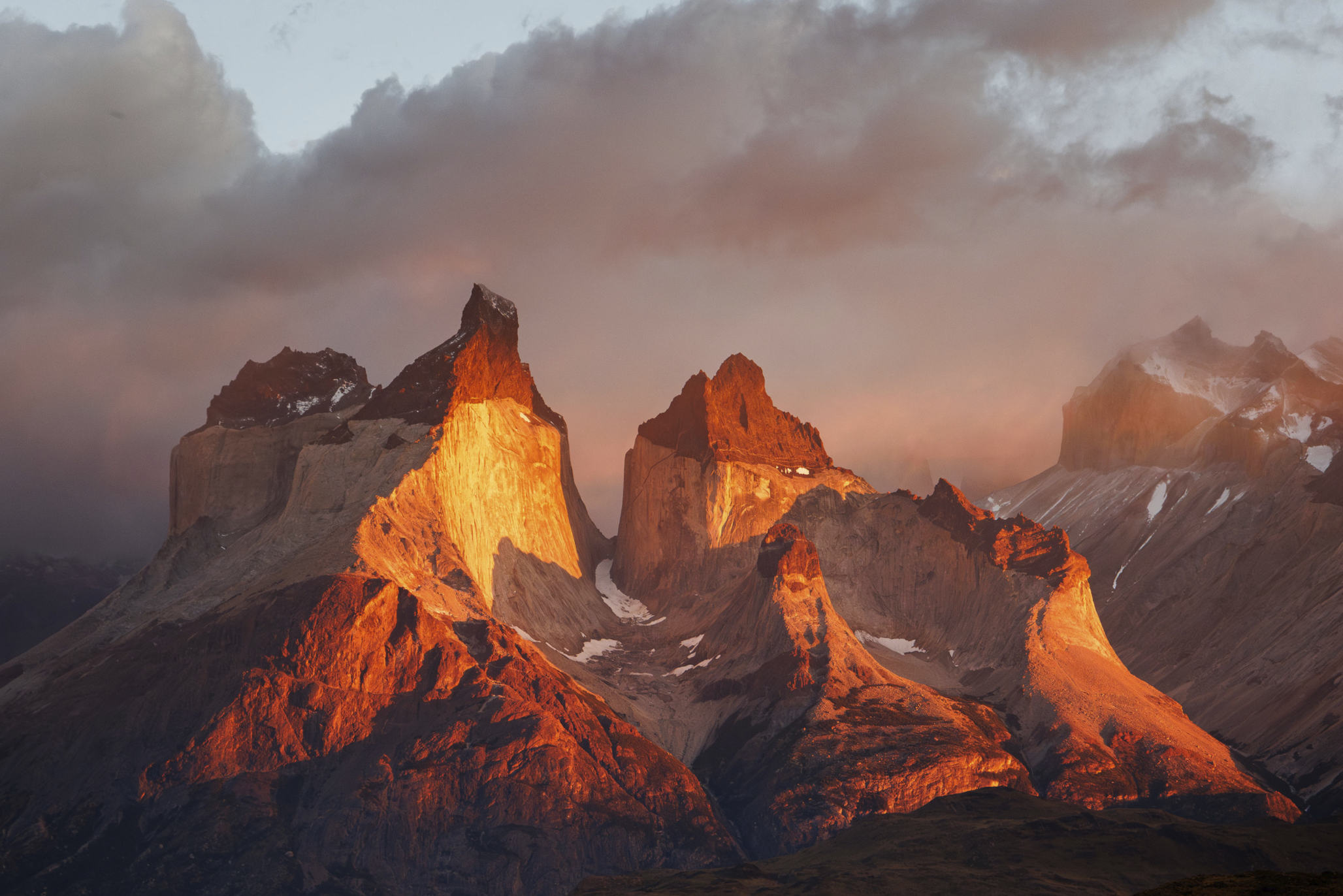 A wide shot of the hotel complex situated in the middle of the vast Patagonian plains.