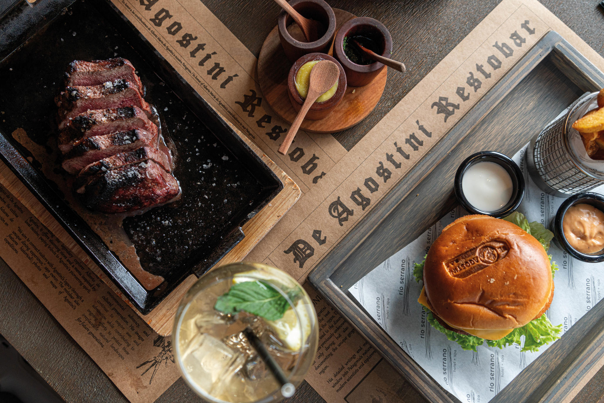 A chef carving local Patagonian lamb for guests at the hotel restaurant.