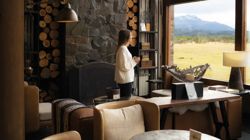 The expansive view of the Torres del Paine mountains from the hotel's main balcony.
