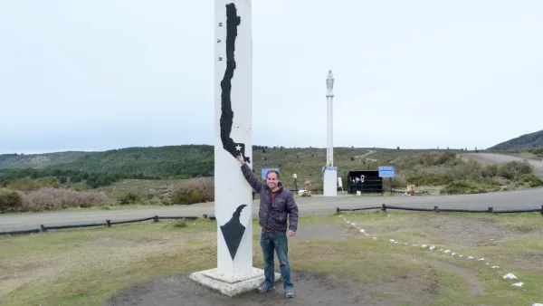 The "Halfway Point of Chile" monument located along the road near Punta Arenas.