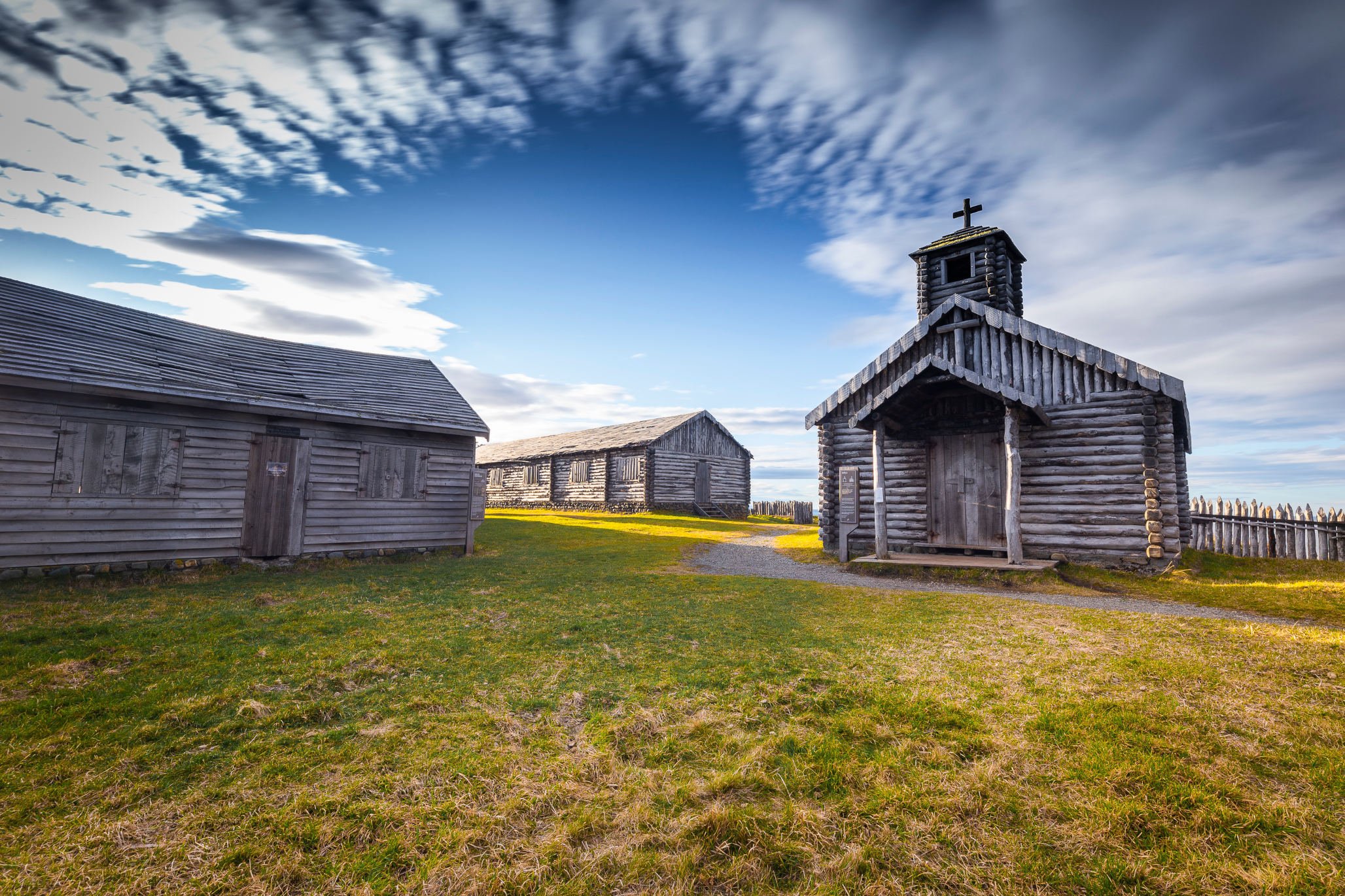 The historic wooden fortifications and chapel inside the Fuerte Bulnes complex.