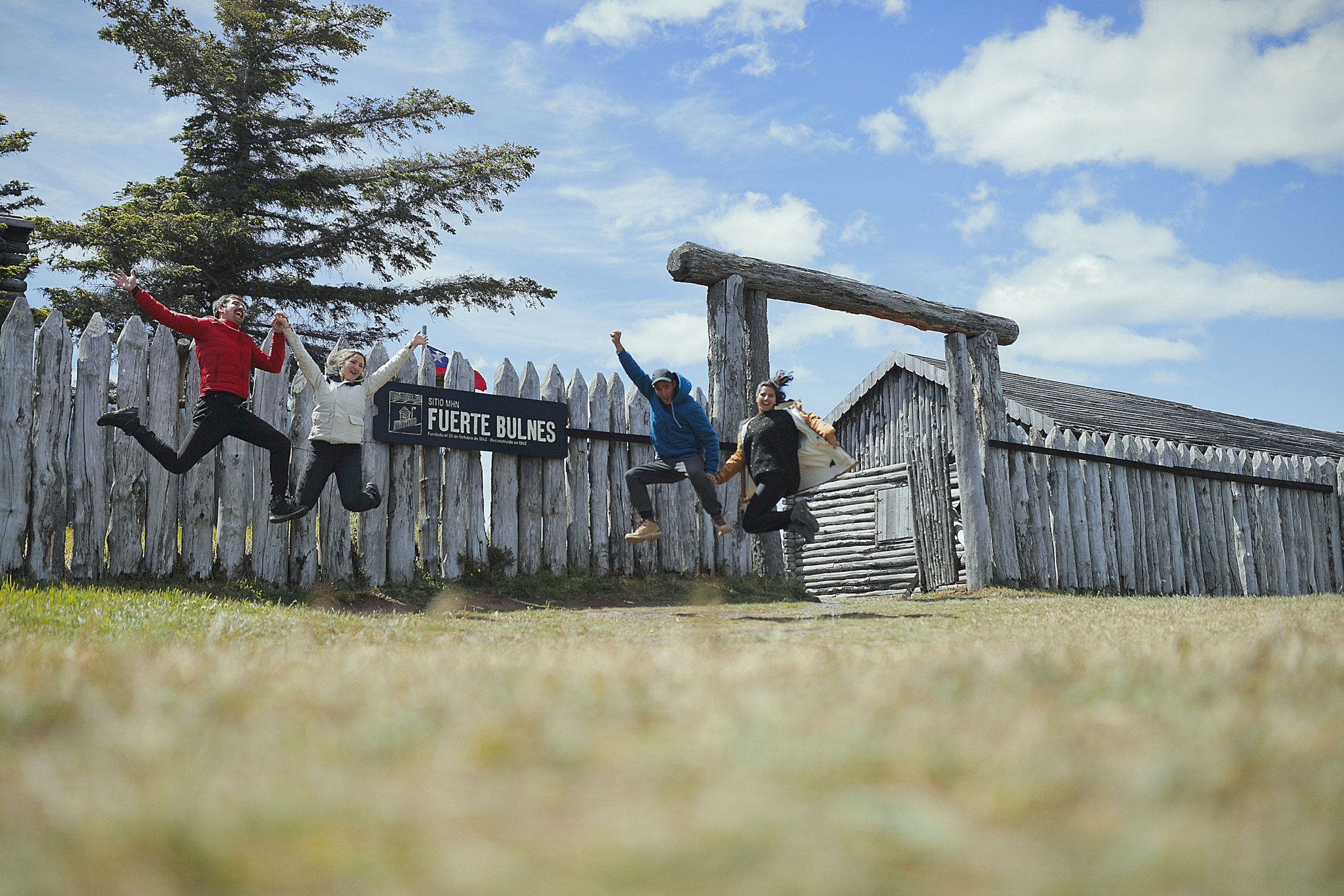 A wooden boardwalk leading visitors through the palisade walls of the fort.
